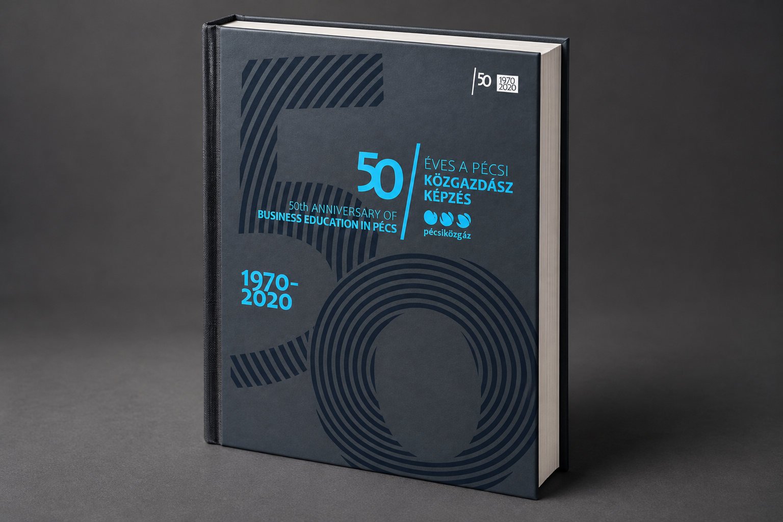 Hardcover book mockup for the 50 Years of Business Education in Pécs campaign